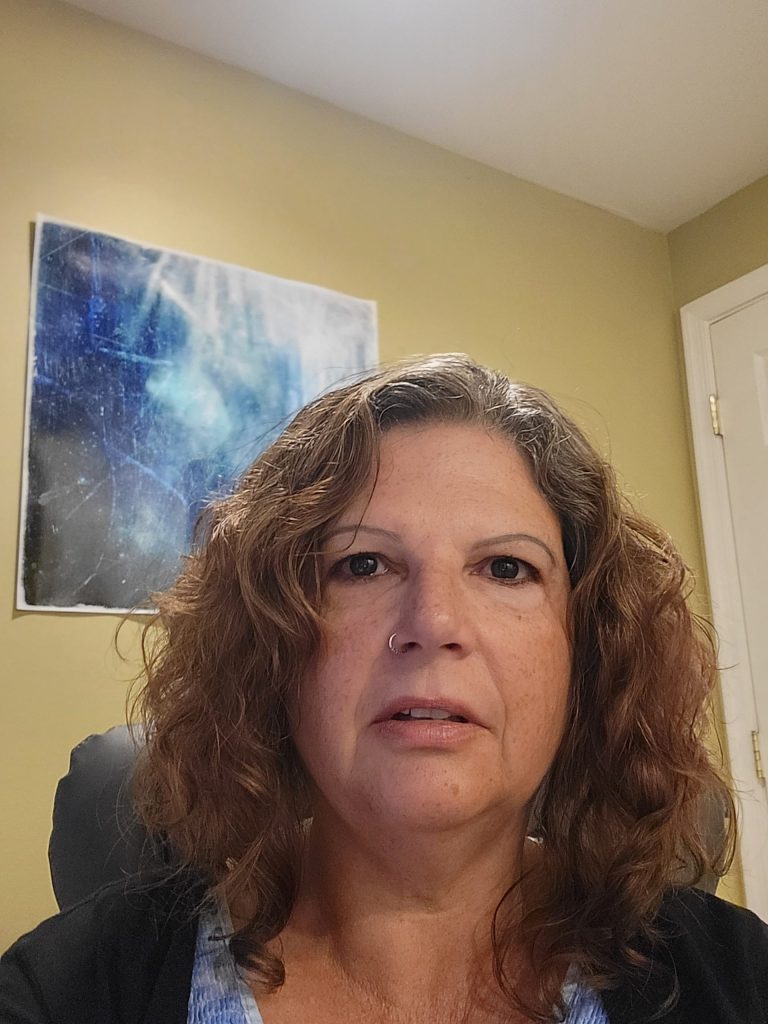 Headshot photo of Tamara Van Newkirk